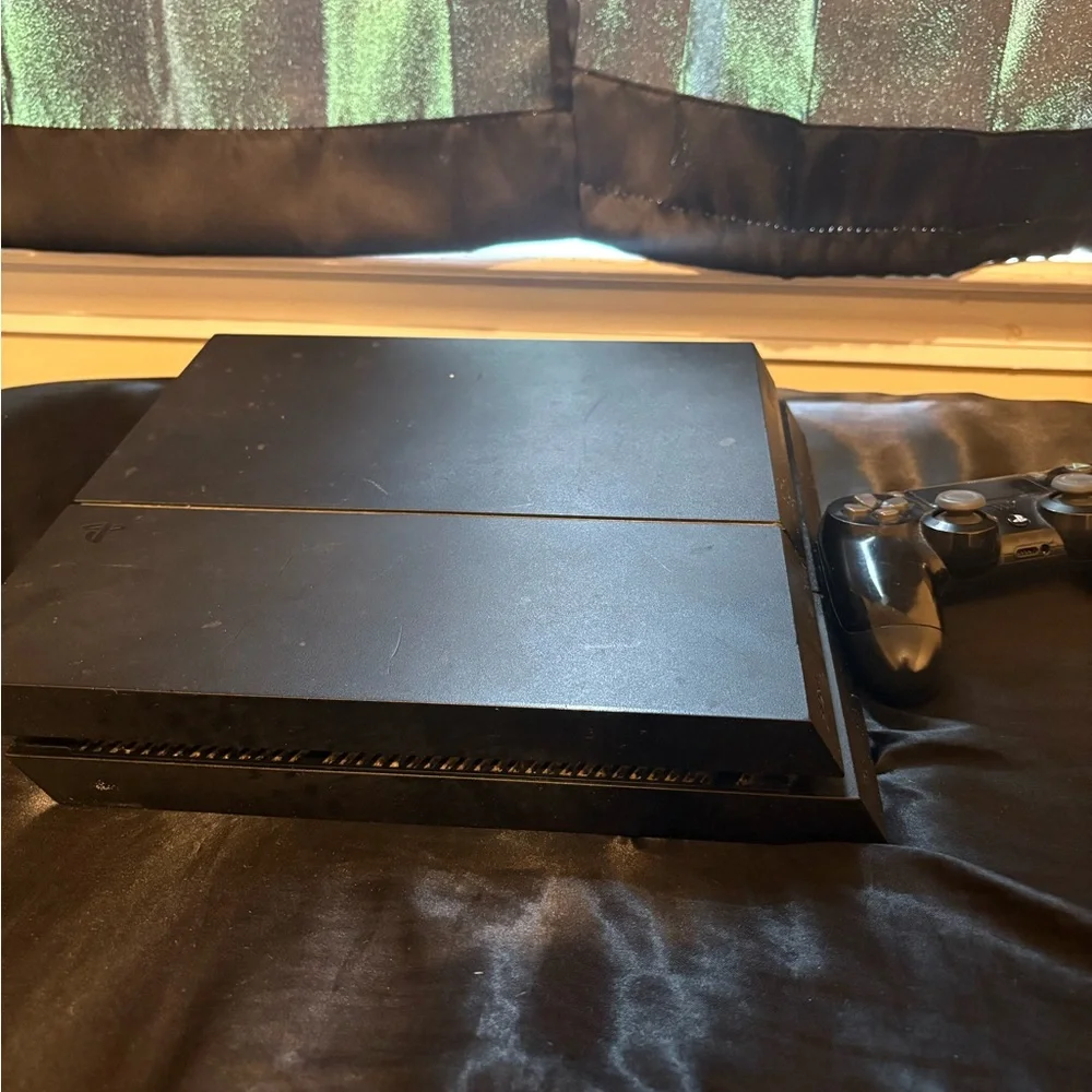 Playstation 4: Sony Black Console for Ultimate Gaming Experience